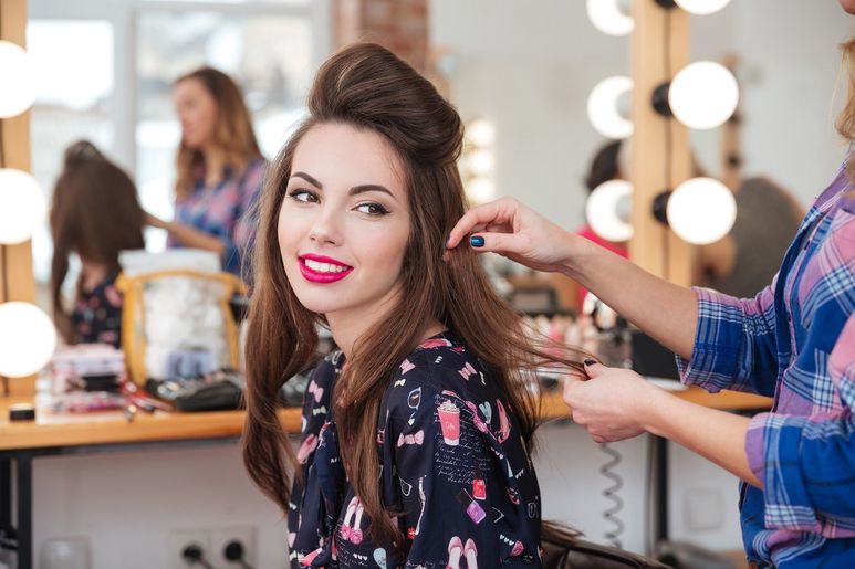 Woman getting hair treatment